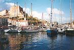 There is a long gulf on the another side of Bonifacio. This gulf is a natural harbour for many yachts. There is a military tower as well...