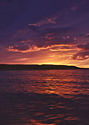 Это закат на море, между Анзером и Большим Соловецким островом. Нередкое явление в сентябре.